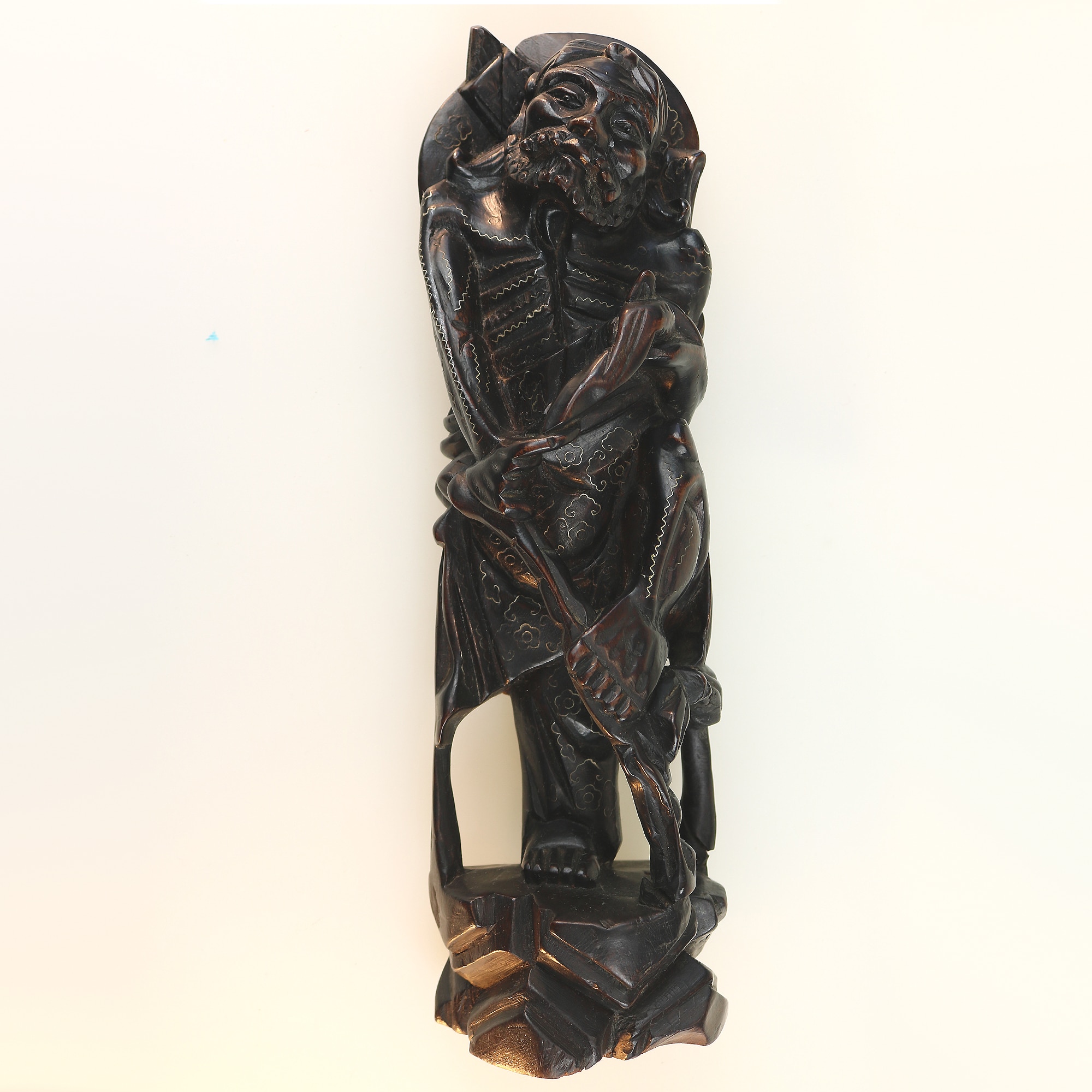 A large antique Chinese silver inlaid hardwood carved Warrior Figurine C.19thC