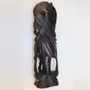 A large antique Chinese silver inlaid hardwood carved Warrior Figurine C.19thC