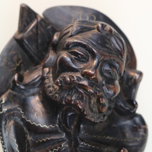 A large antique Chinese silver inlaid hardwood carved Warrior Figurine C.19thC