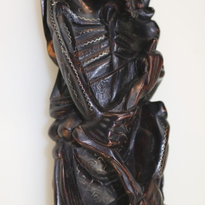 A large antique Chinese silver inlaid hardwood carved Warrior Figurine C.19thC