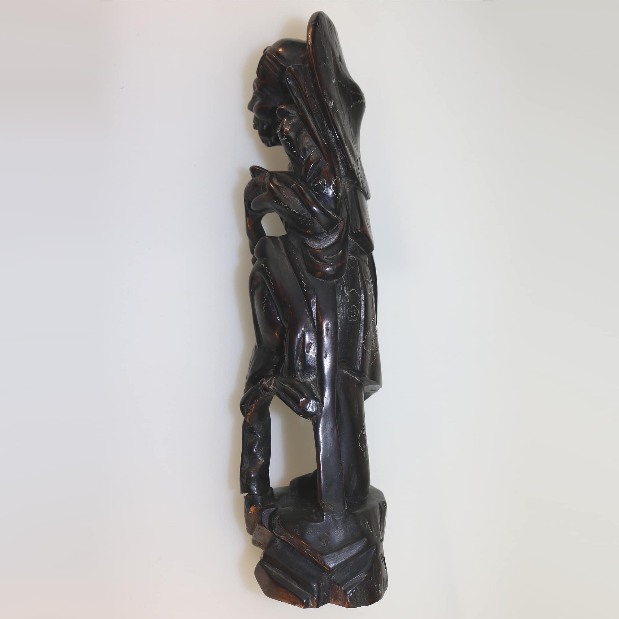 A large antique Chinese silver inlaid hardwood carved Warrior Figurine C.19thC