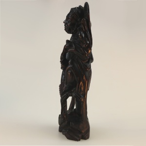 A large antique Chinese silver inlaid hardwood carved Warrior Figurine C.19thC