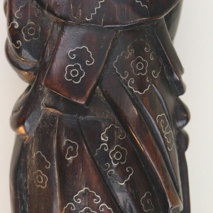 A large antique Chinese silver inlaid hardwood carved Warrior Figurine C.19thC