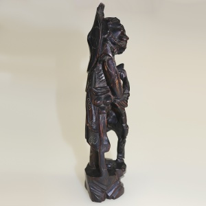 A large antique Chinese silver inlaid hardwood carved Warrior Figurine C.19thC