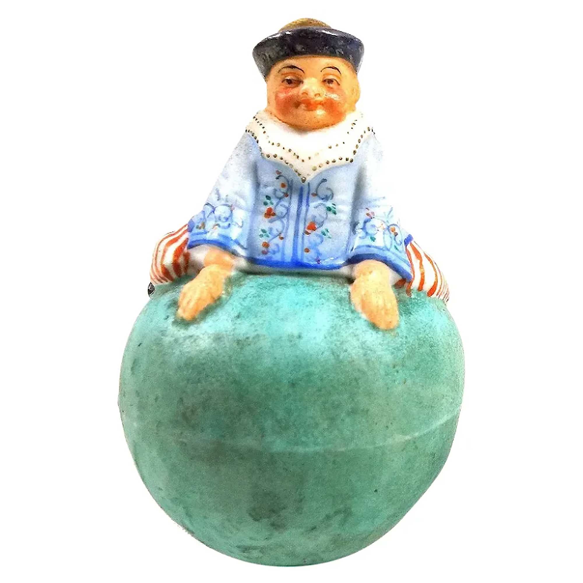 A rare antique coloured bisque porcelain novelty Roly Poly Clown Figure C.1900+