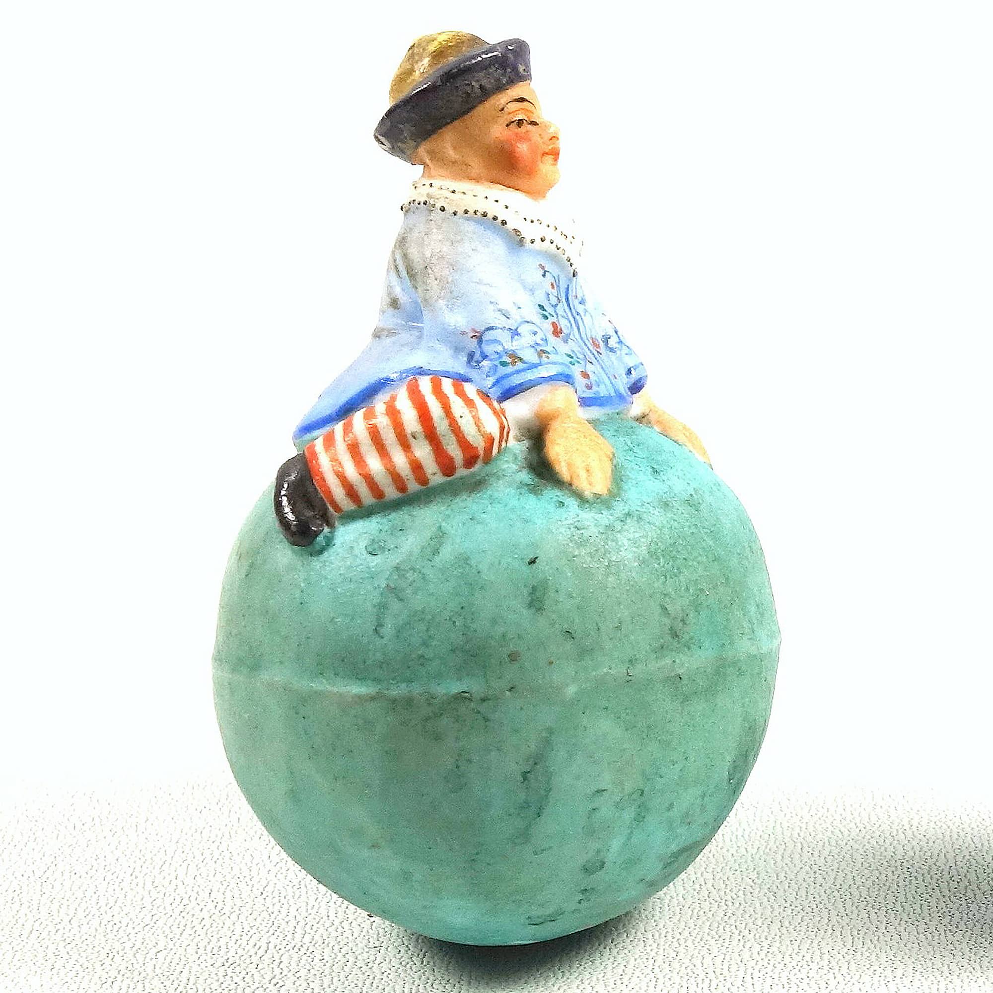 A rare antique coloured bisque porcelain novelty Roly Poly Clown Figure C.1900+