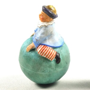 A rare antique coloured bisque porcelain novelty Roly Poly Clown Figure C.1900+