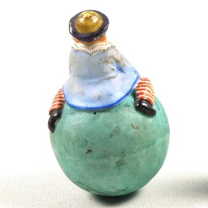 A rare antique coloured bisque porcelain novelty Roly Poly Clown Figure C.1900+