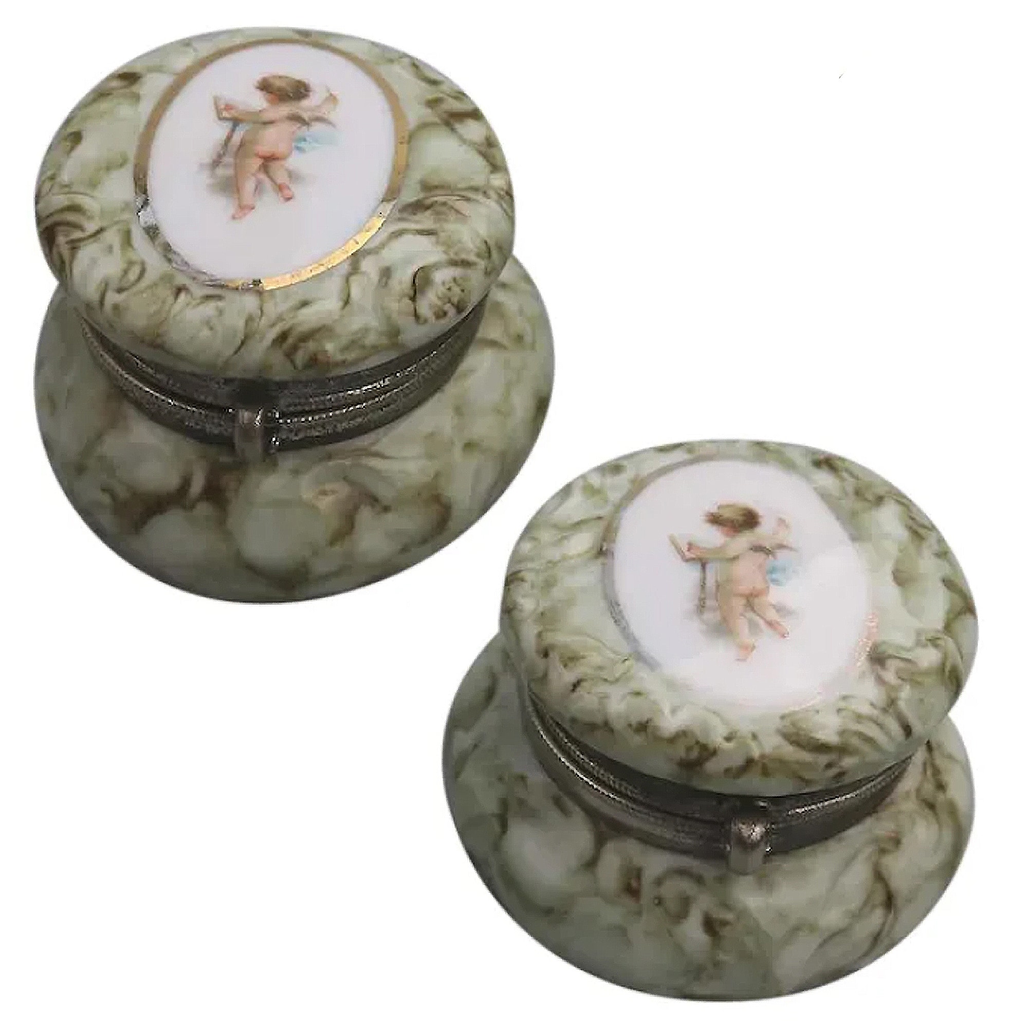 A pair of antique porcelain Continental cherub lidded Jars / Boxes C.19thC