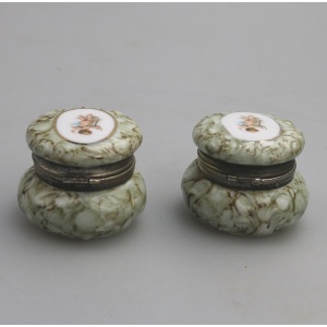 A pair of antique porcelain Continental cherub lidded Jars / Boxes C.19thC