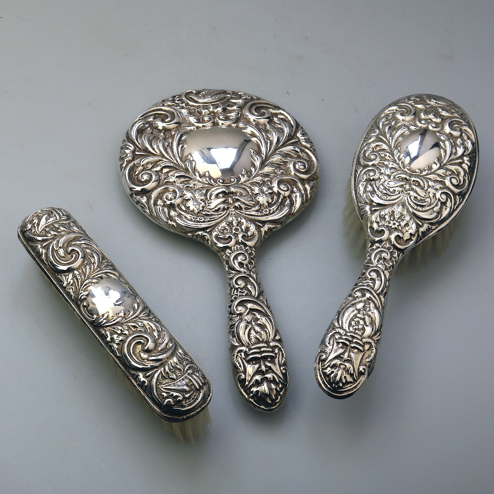 English solid silver Green Man Bird Mirror & Hairbrush + 1 Clothes Brush C.20thC
