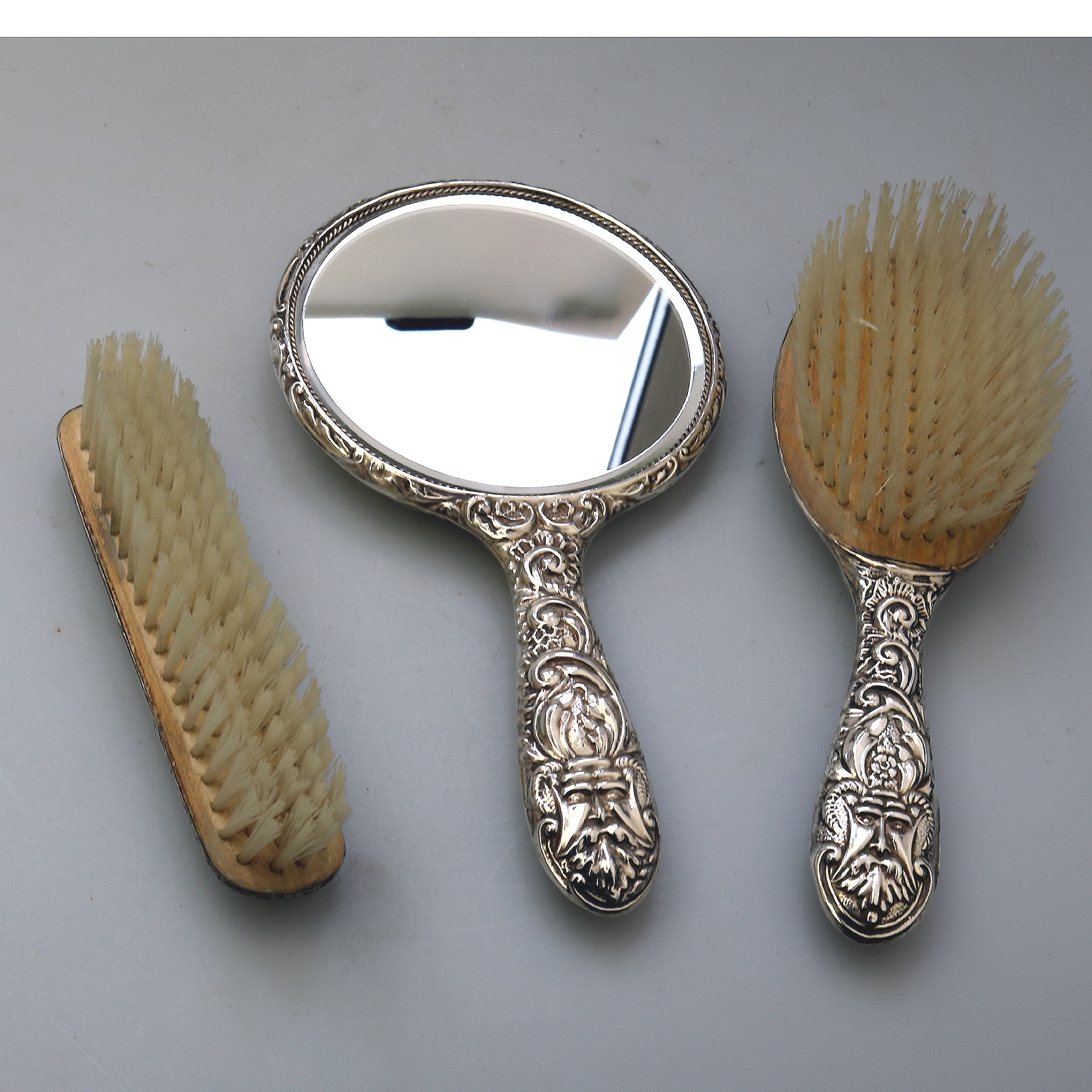 English solid silver Green Man Bird Mirror & Hairbrush + 1 Clothes Brush C.20thC