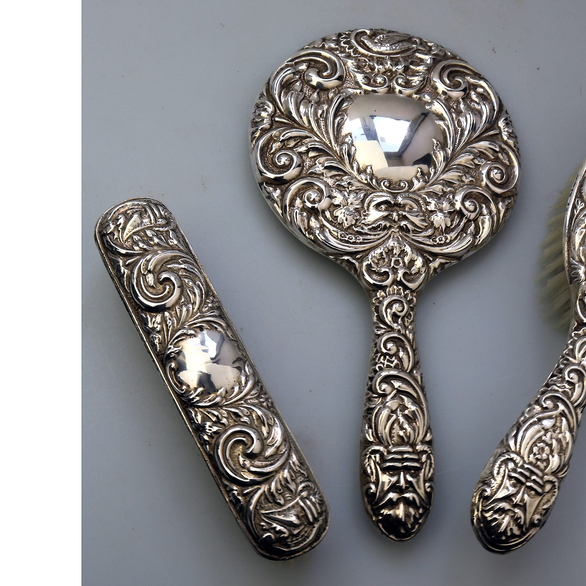 English solid silver Green Man Bird Mirror & Hairbrush + 1 Clothes Brush C.20thC