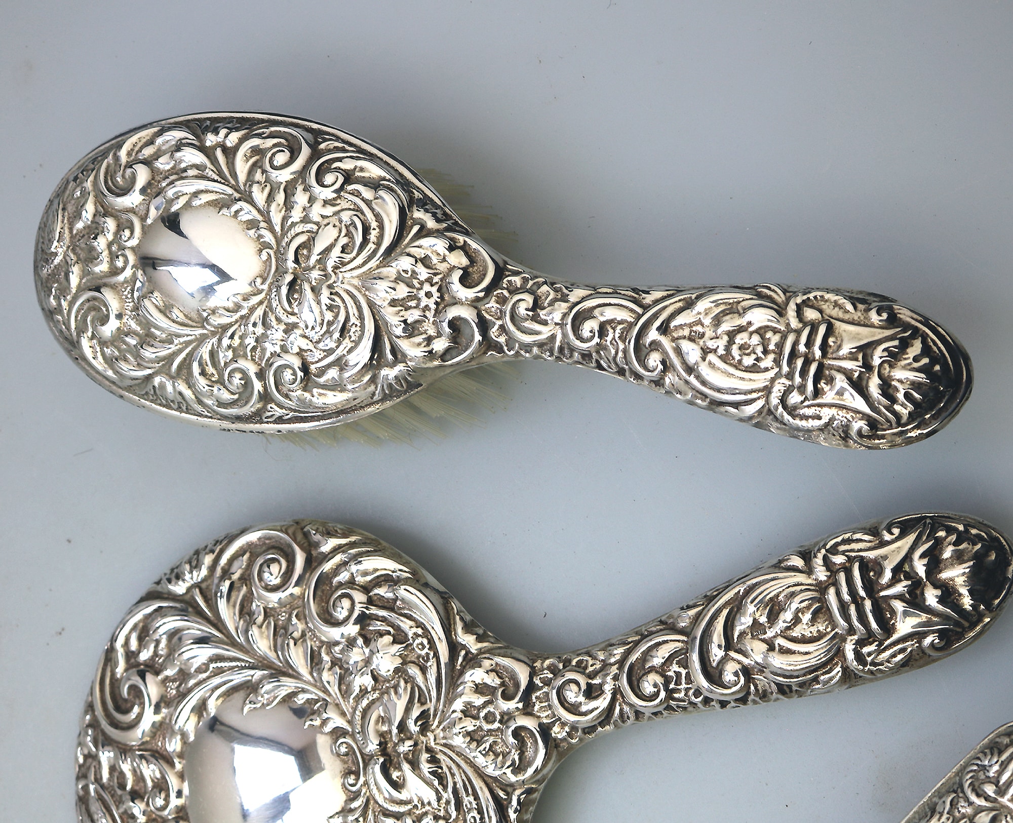 English solid silver Green Man Bird Mirror & Hairbrush + 1 Clothes Brush C.20thC