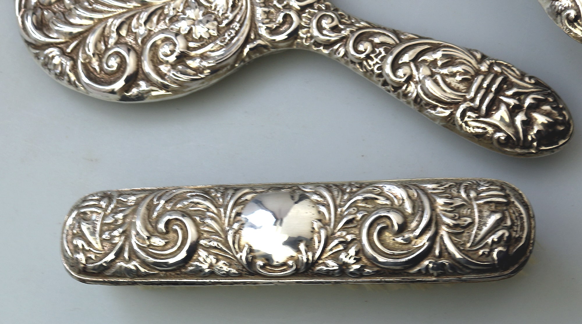 English solid silver Green Man Bird Mirror & Hairbrush + 1 Clothes Brush C.20thC
