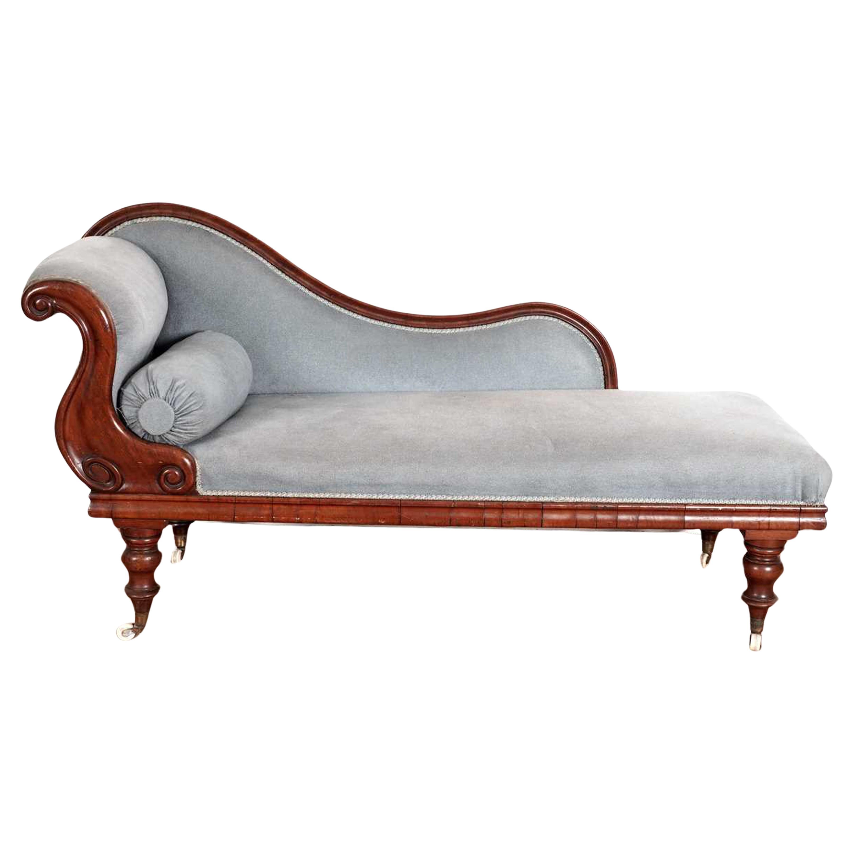 A Victorian Mahogany Swan Back Chaise Longue Upholstered in a Blue Velvet Fabric