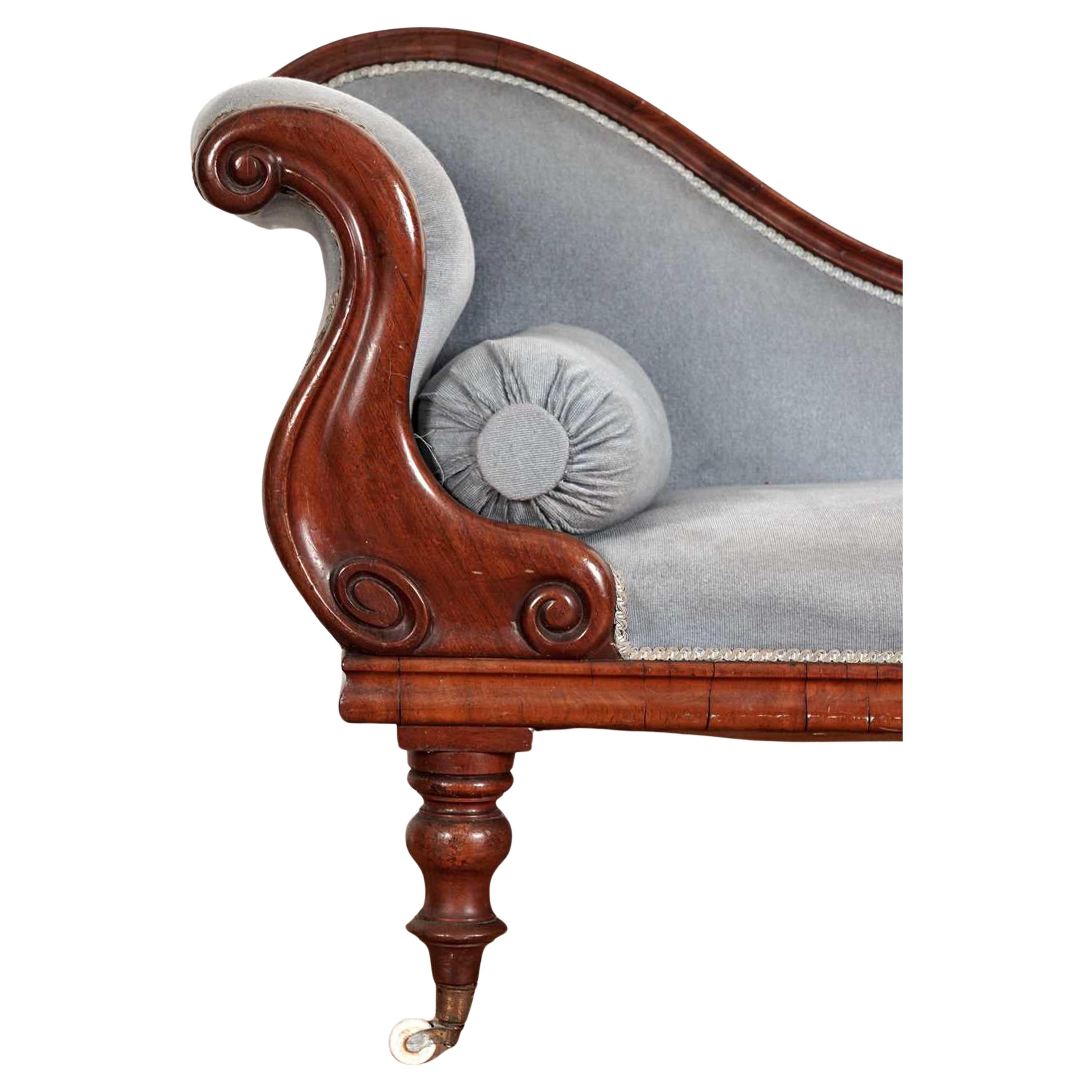 A Victorian Mahogany Swan Back Chaise Longue Upholstered in a Blue Velvet Fabric