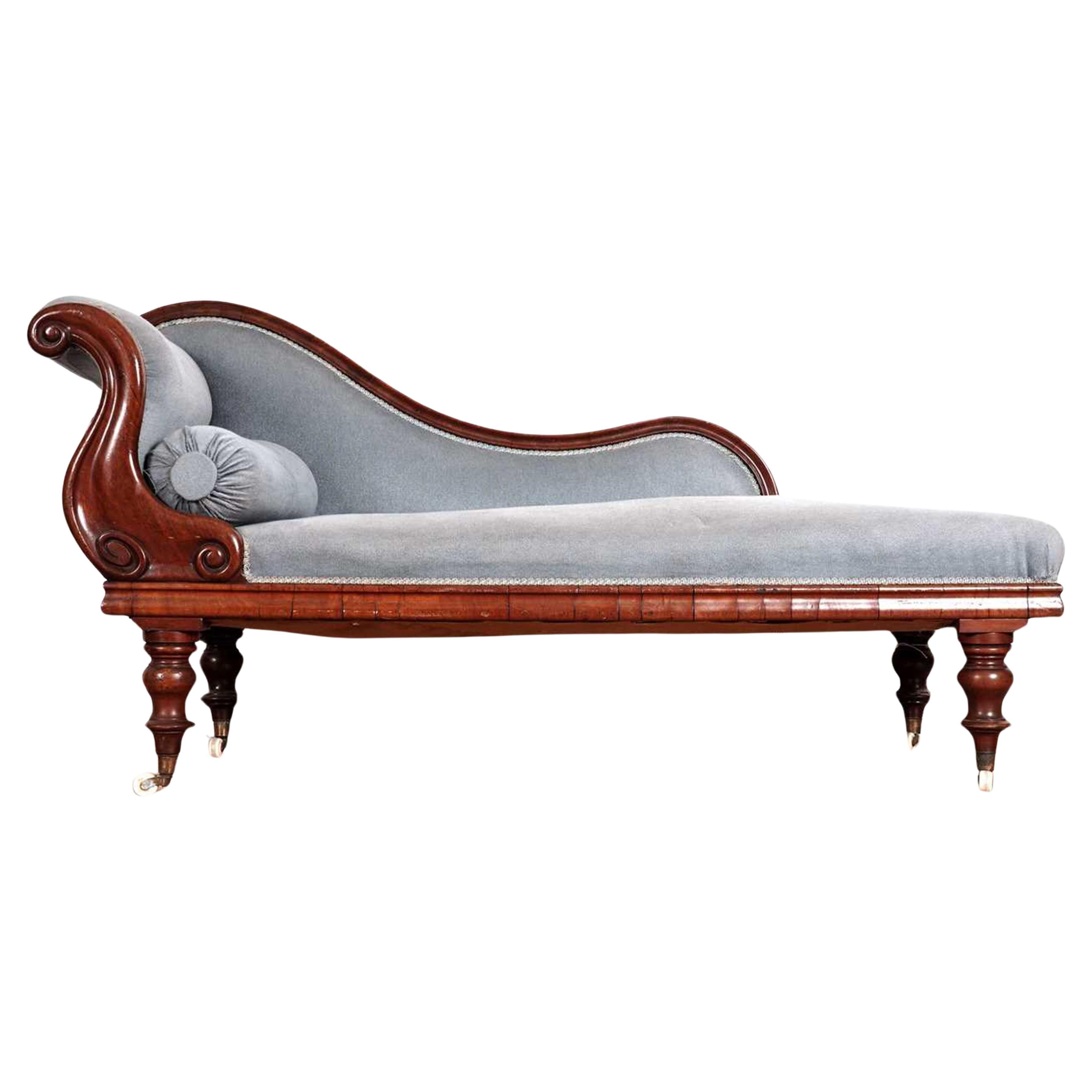 A Victorian Mahogany Swan Back Chaise Longue Upholstered in a Blue Velvet Fabric