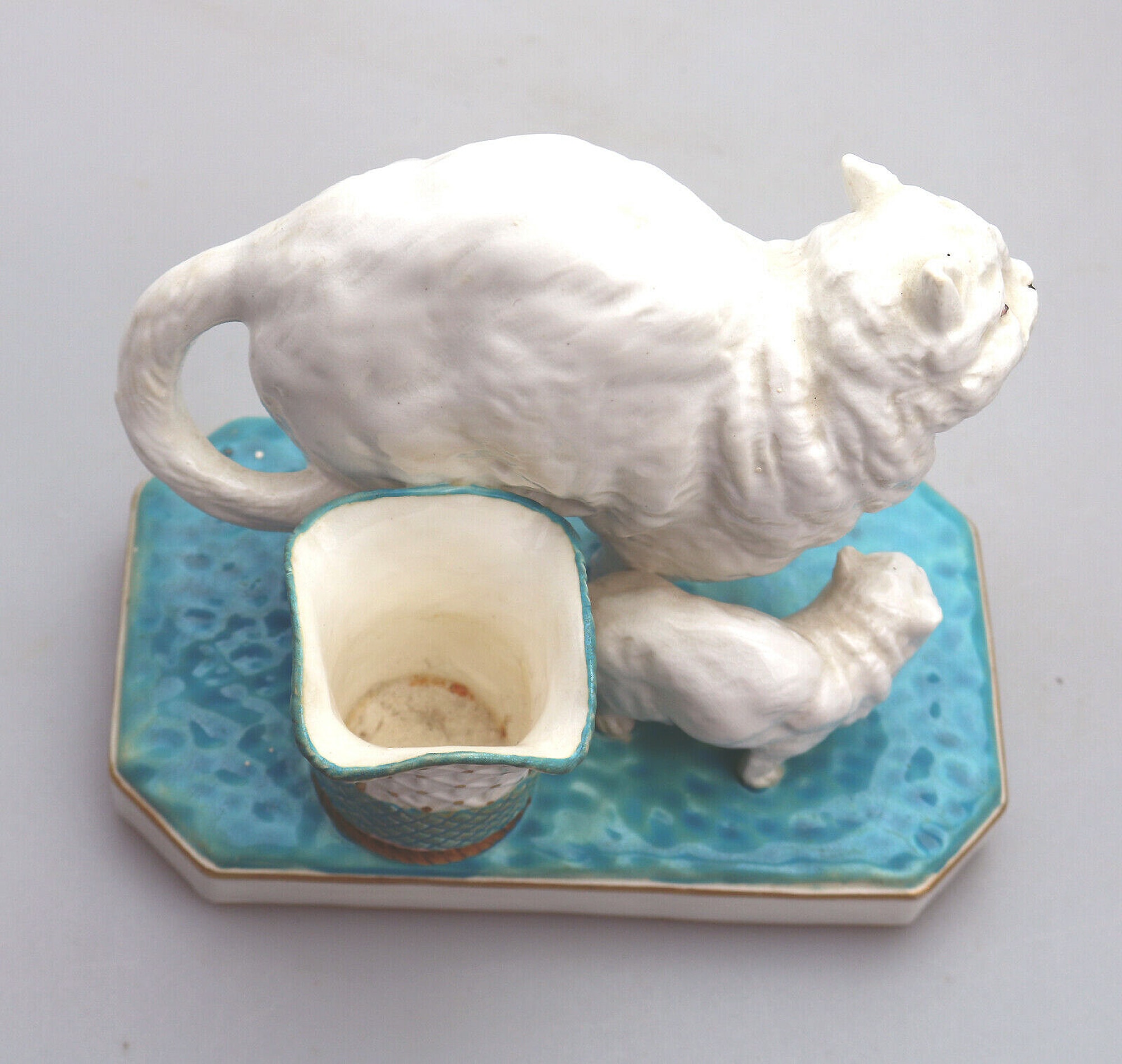 An unusual antique novelty Cat & Kitten porcelain Striker / Match Holder C.19thC