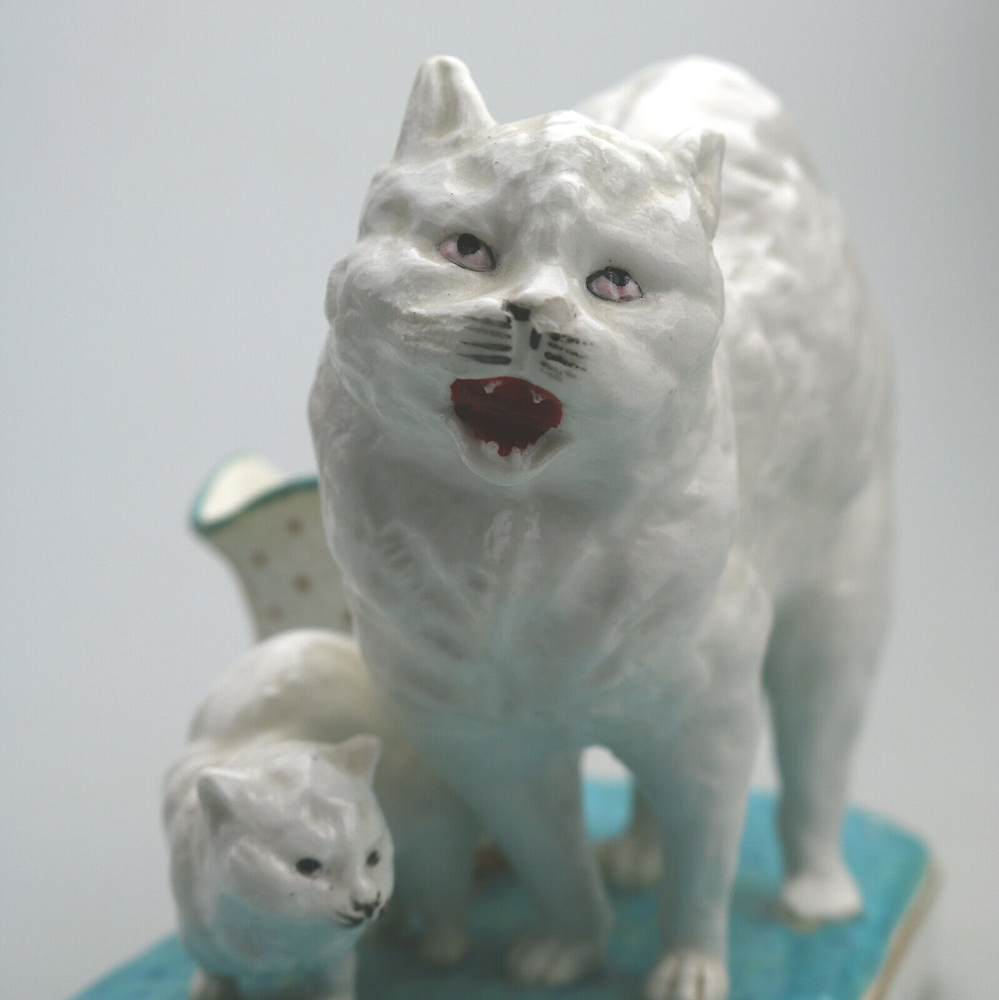 An unusual antique novelty Cat & Kitten porcelain Striker / Match Holder C.19thC