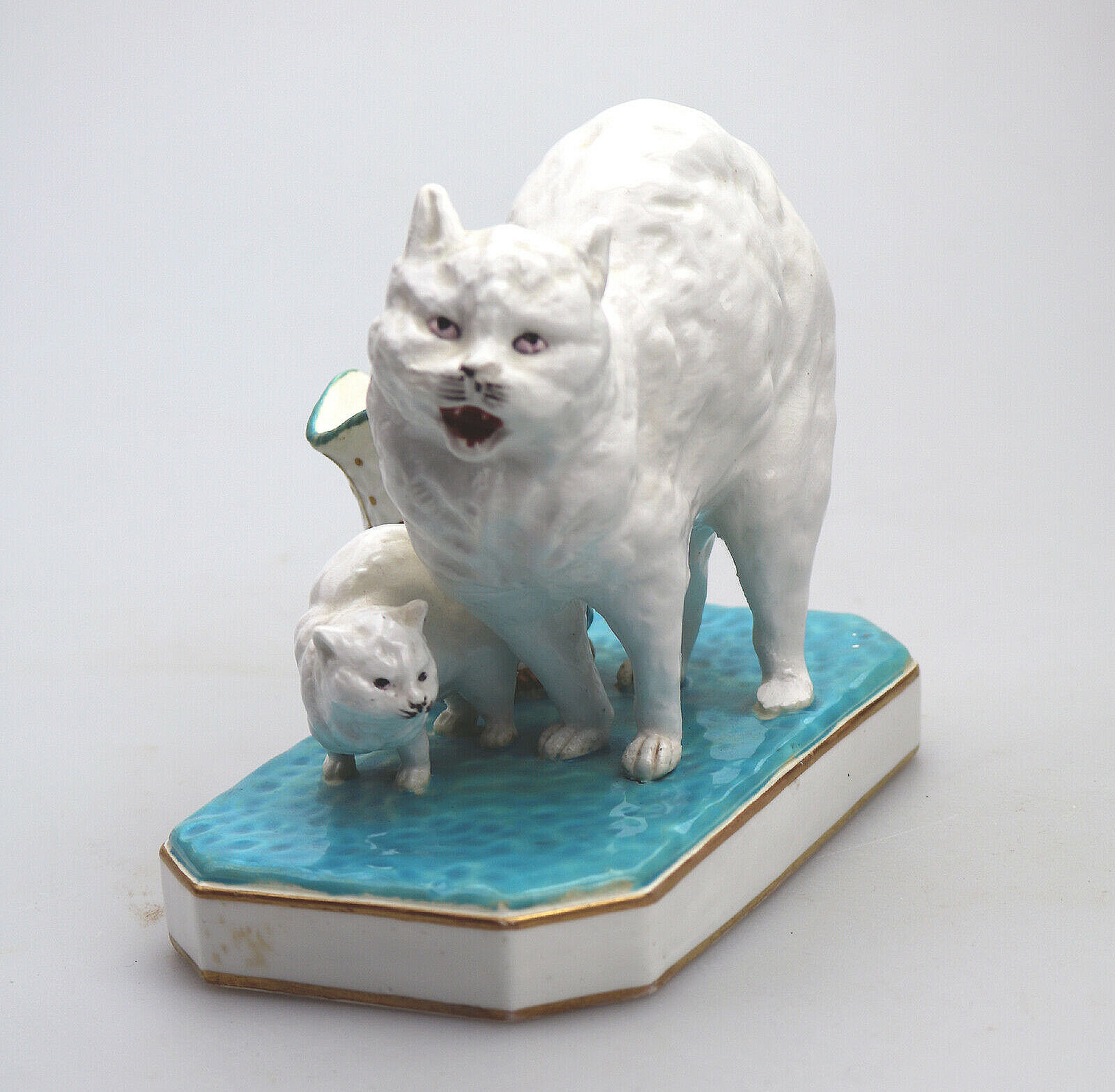 An unusual antique novelty Cat & Kitten porcelain Striker / Match Holder C.19thC