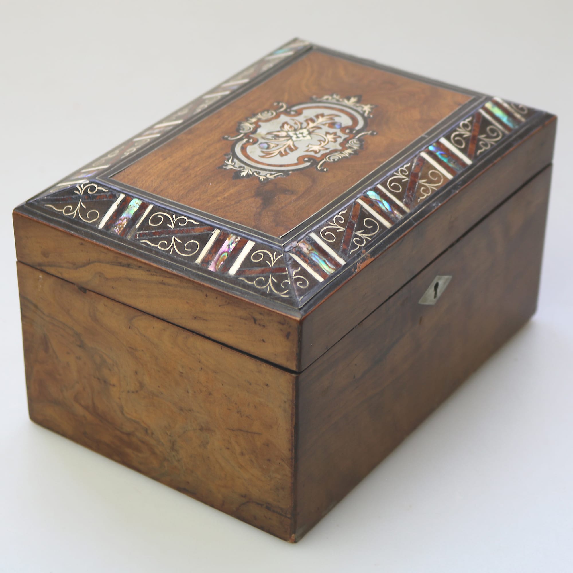 A fine antique inlaid walnut and silver abalone shell etc... Tea Caddy C.19thC