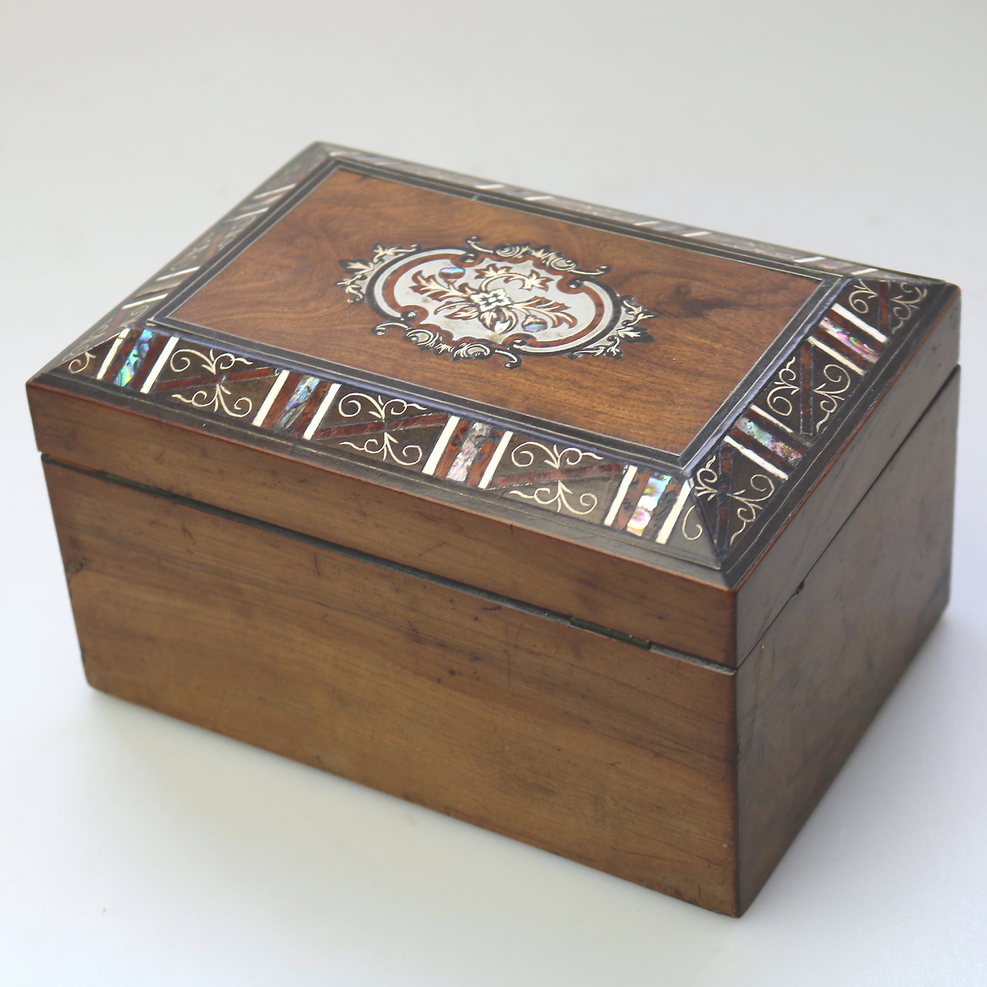 A fine antique inlaid walnut and silver abalone shell etc... Tea Caddy C.19thC