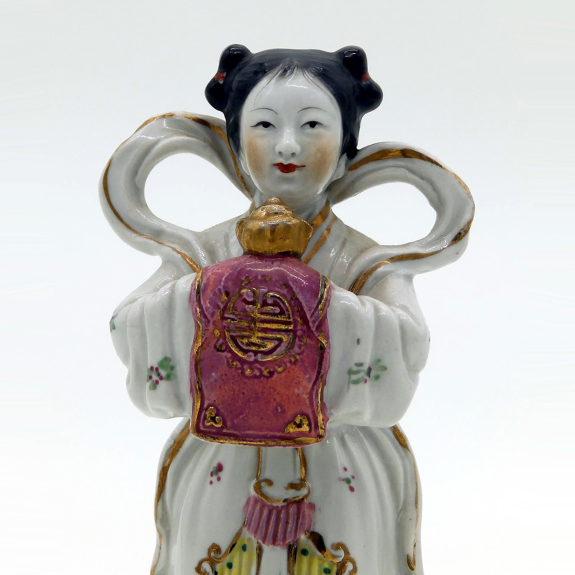 An antique Chinese porcelain Figure of girl stood on a lotus flower C.1900+
