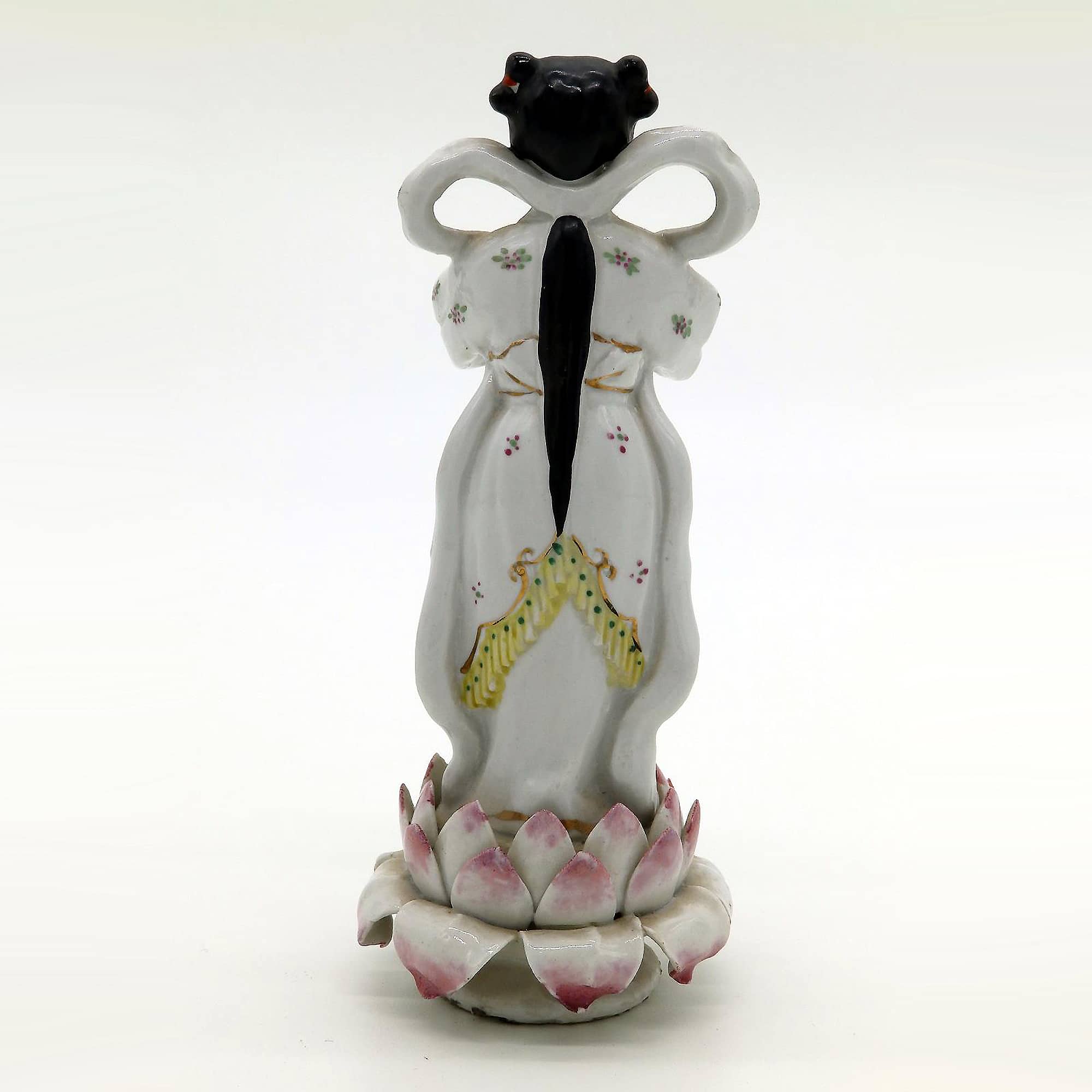 An antique Chinese porcelain Figure of girl stood on a lotus flower C.1900+