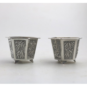 A good pair antique Chinese solid silver novelty Wang Hing Salts & liners C.1900