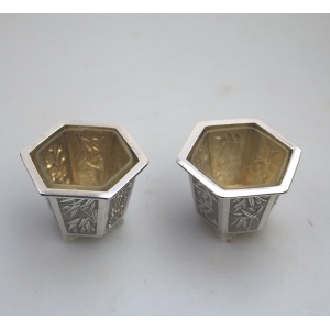 A good pair antique Chinese solid silver novelty Wang Hing Salts & liners C.1900