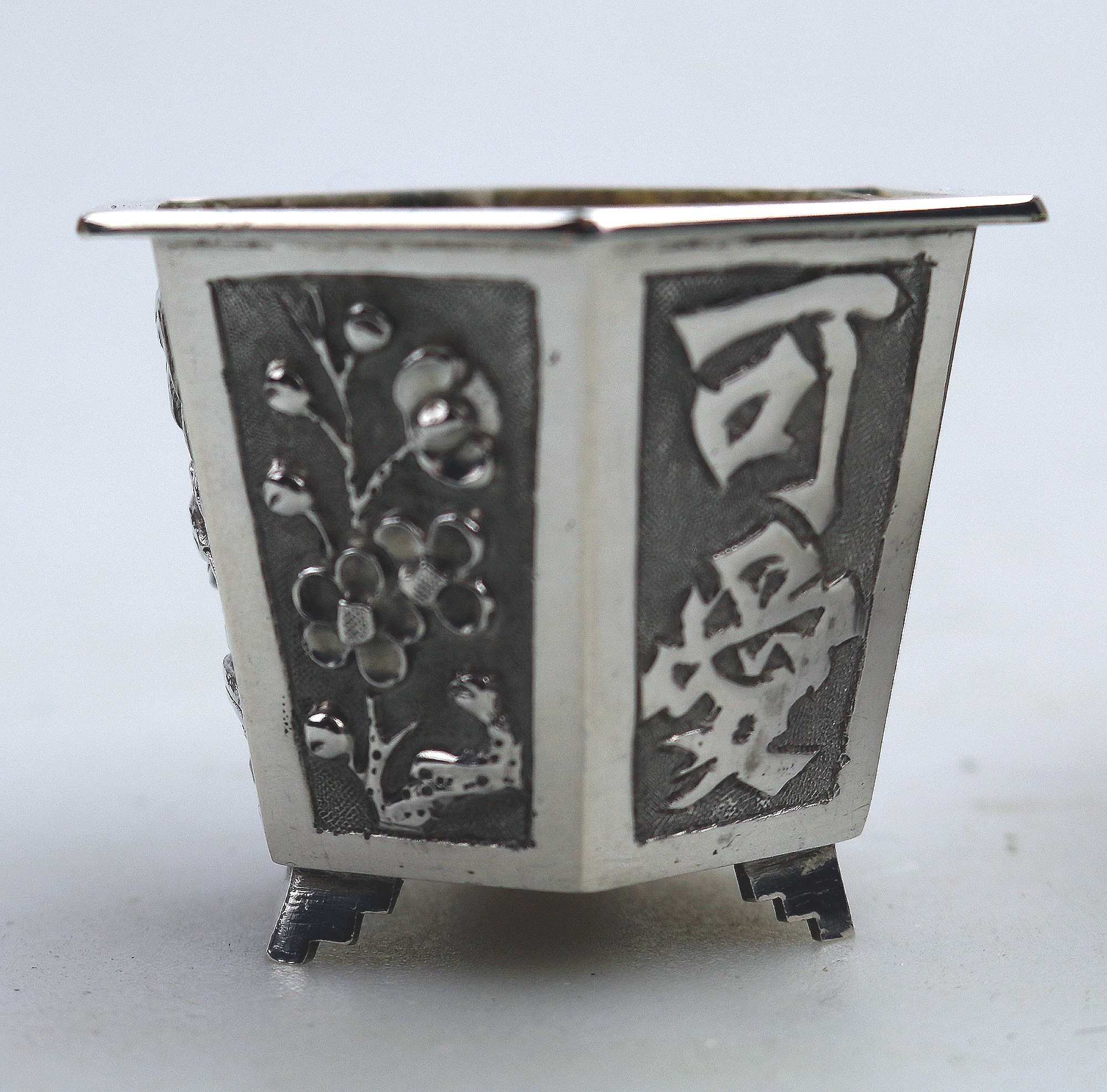A good pair antique Chinese solid silver novelty Wang Hing Salts & liners C.1900