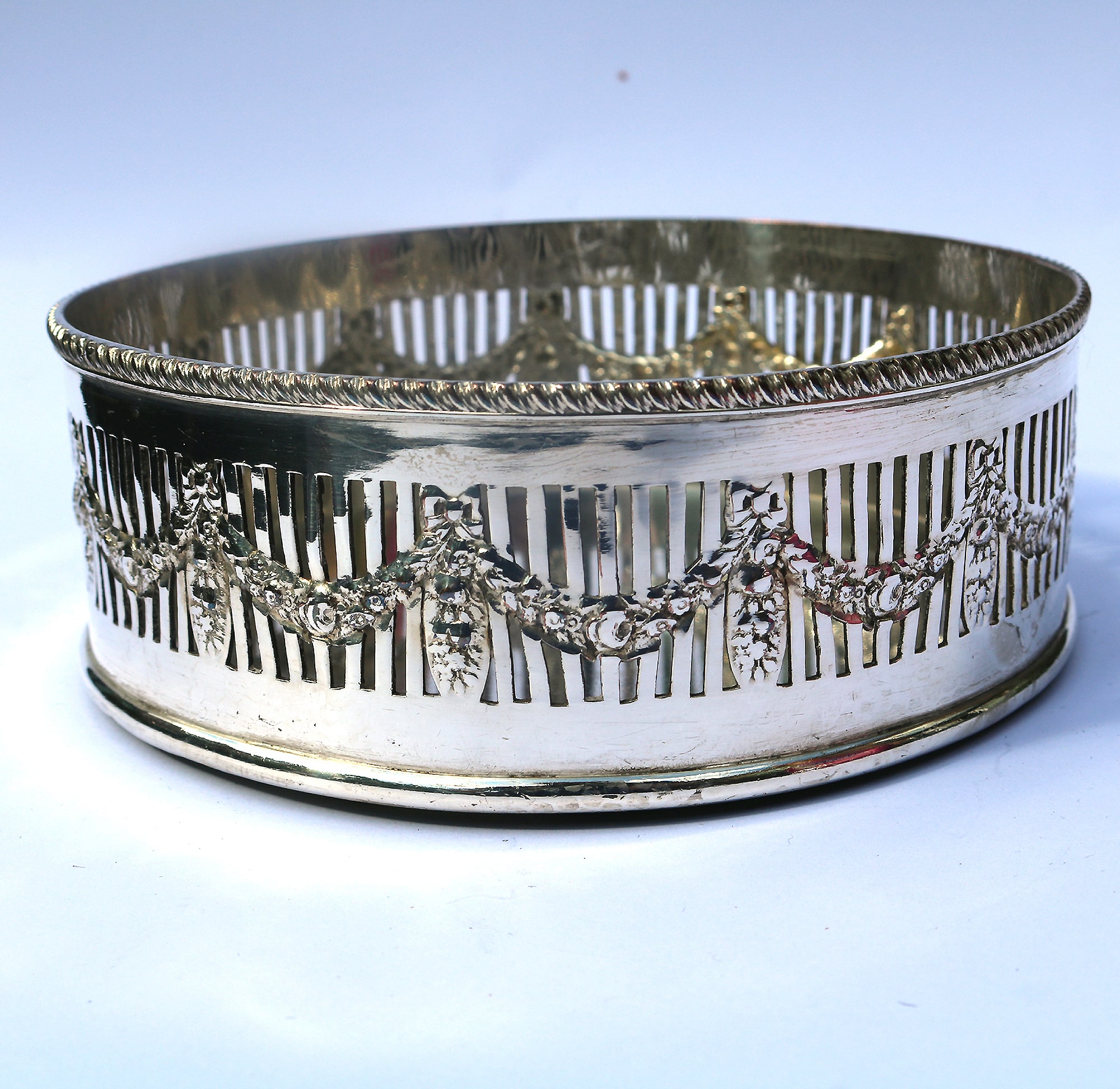 An antique silver plated on copper pierced Decanter Stand Coaster C.1900