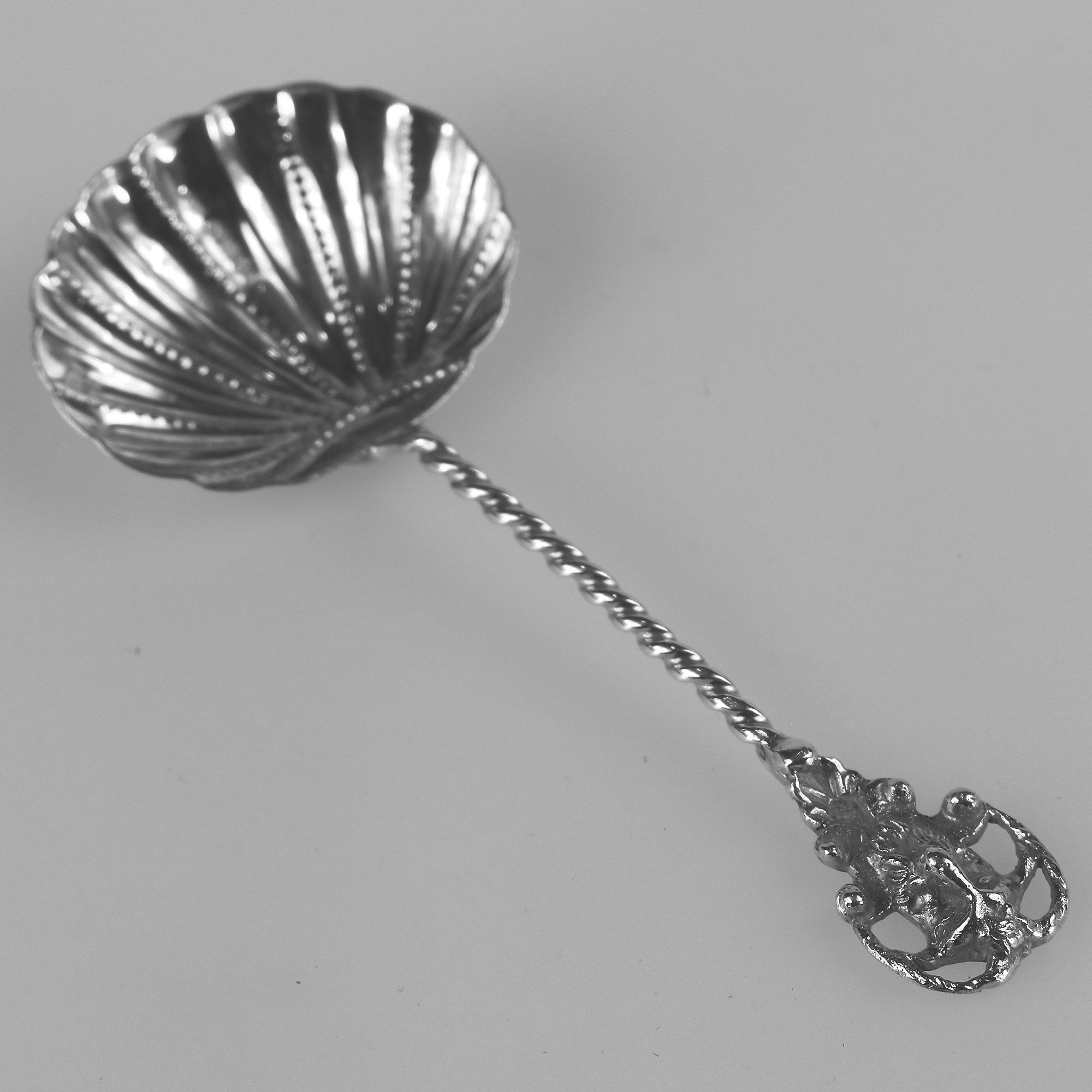 An unusual antique solid silver novelty devil Serving Spoon by Samuel Boyce Landeck C.1904