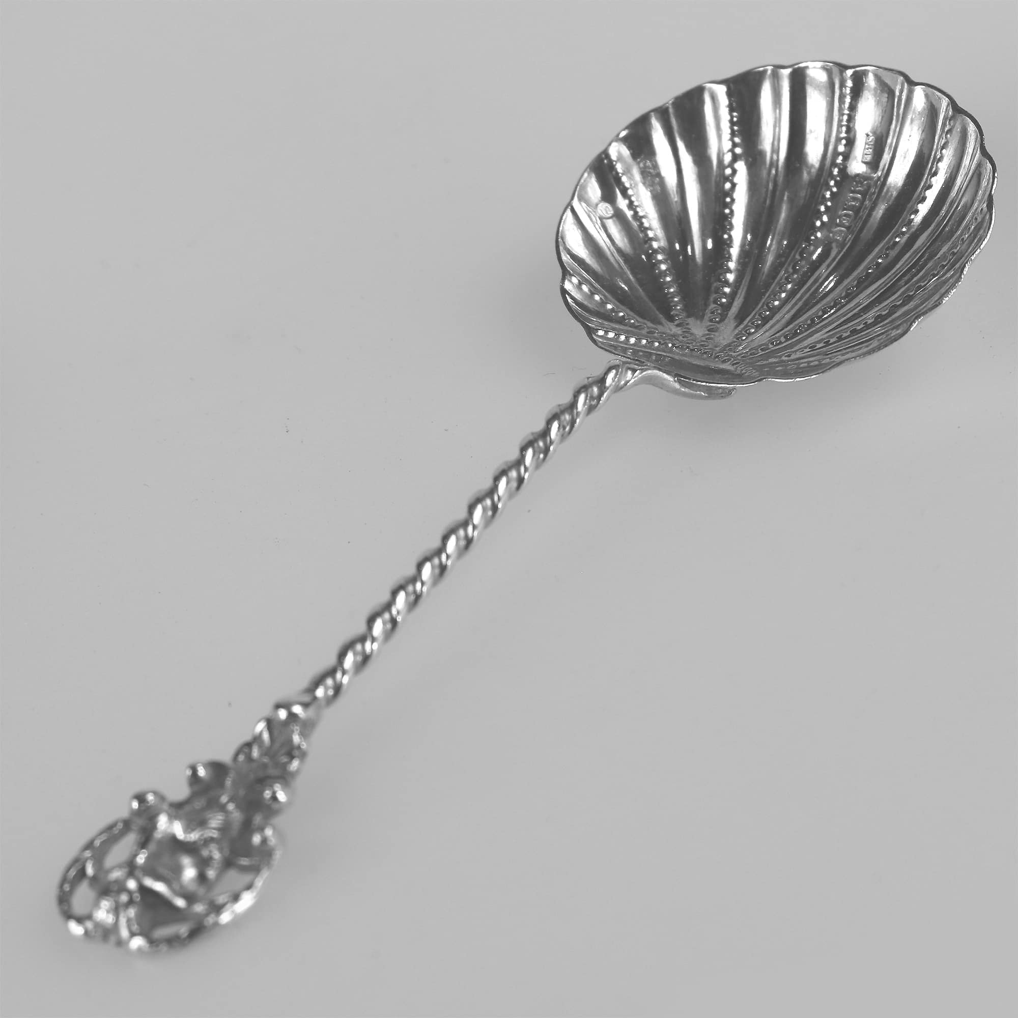 An unusual antique solid silver novelty devil Serving Spoon by Samuel Boyce Landeck C.1904