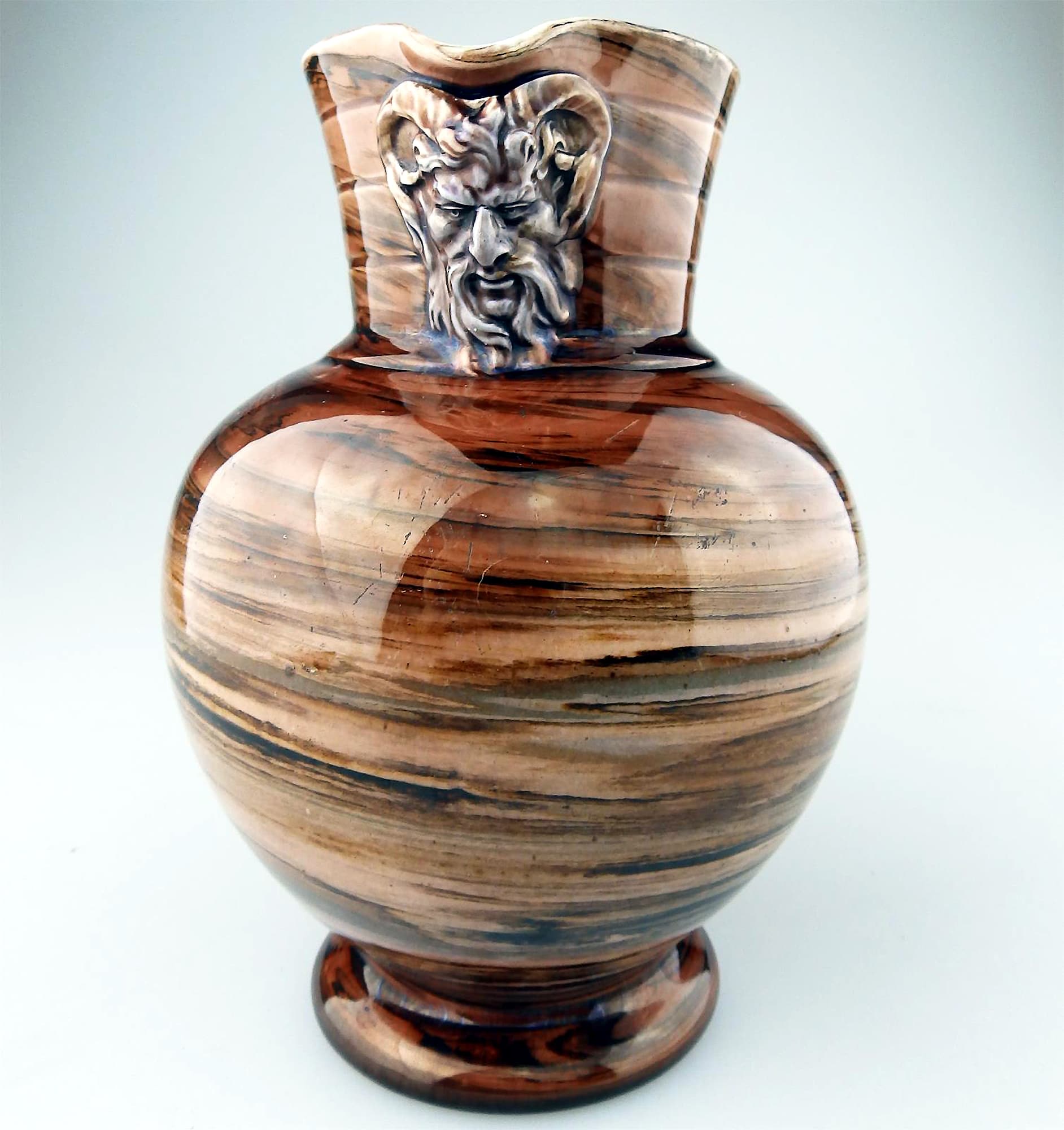 A Wedgwood antique majolica pottery marbled Doric satyr / devil Mask Jug C.1870