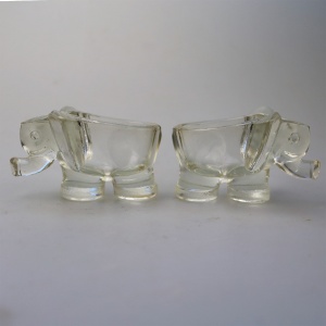 An unusual pair of Art Deco novelty elephant pressed glass Salt Cellars C.1920's