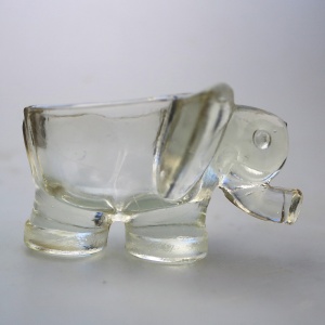 An unusual pair of Art Deco novelty elephant pressed glass Salt Cellars C.1920's