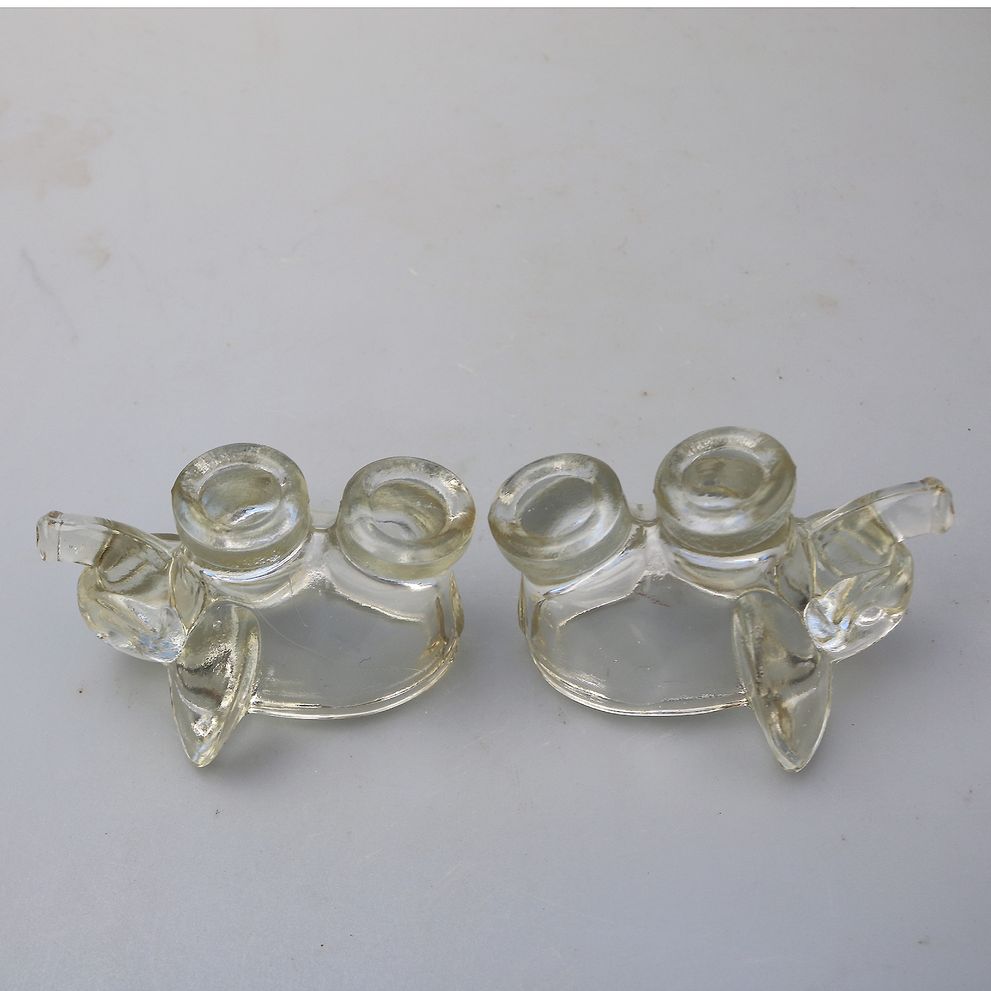 An unusual pair of Art Deco novelty elephant pressed glass Salt Cellars C.1920's