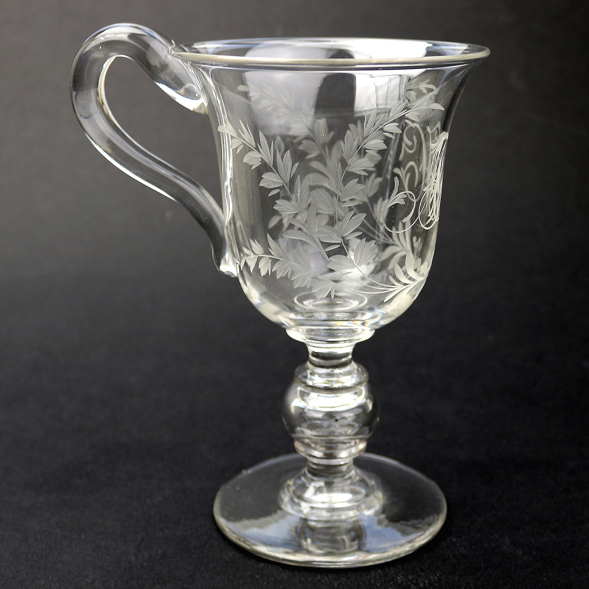 An unusual & substantial antique Victorian engraved hollow stem glass Goblet 19thC