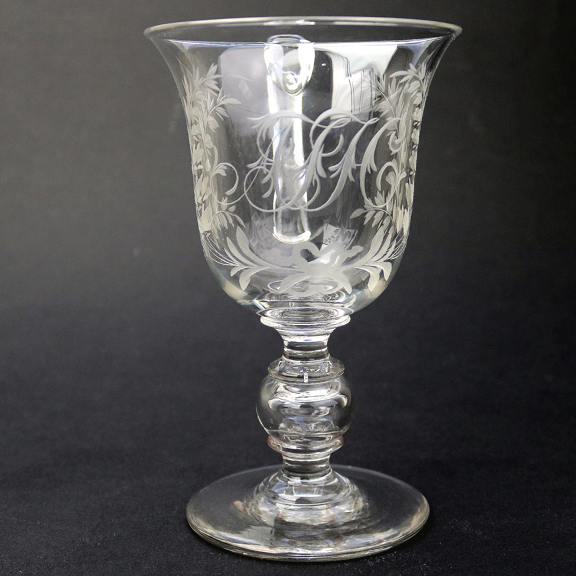 An unusual & substantial antique Victorian engraved hollow stem glass Goblet 19thC