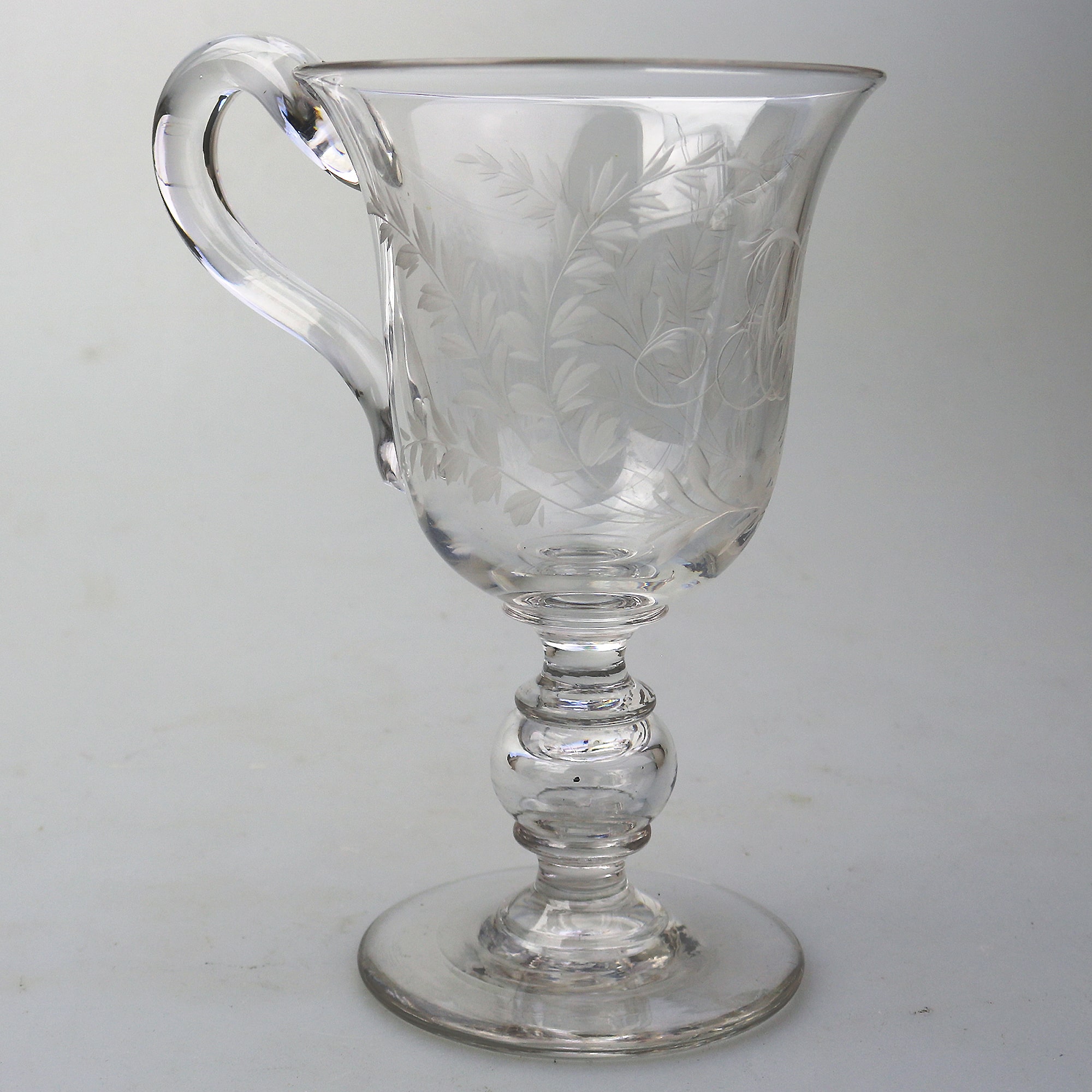 An unusual & substantial antique Victorian engraved hollow stem glass Goblet 19thC