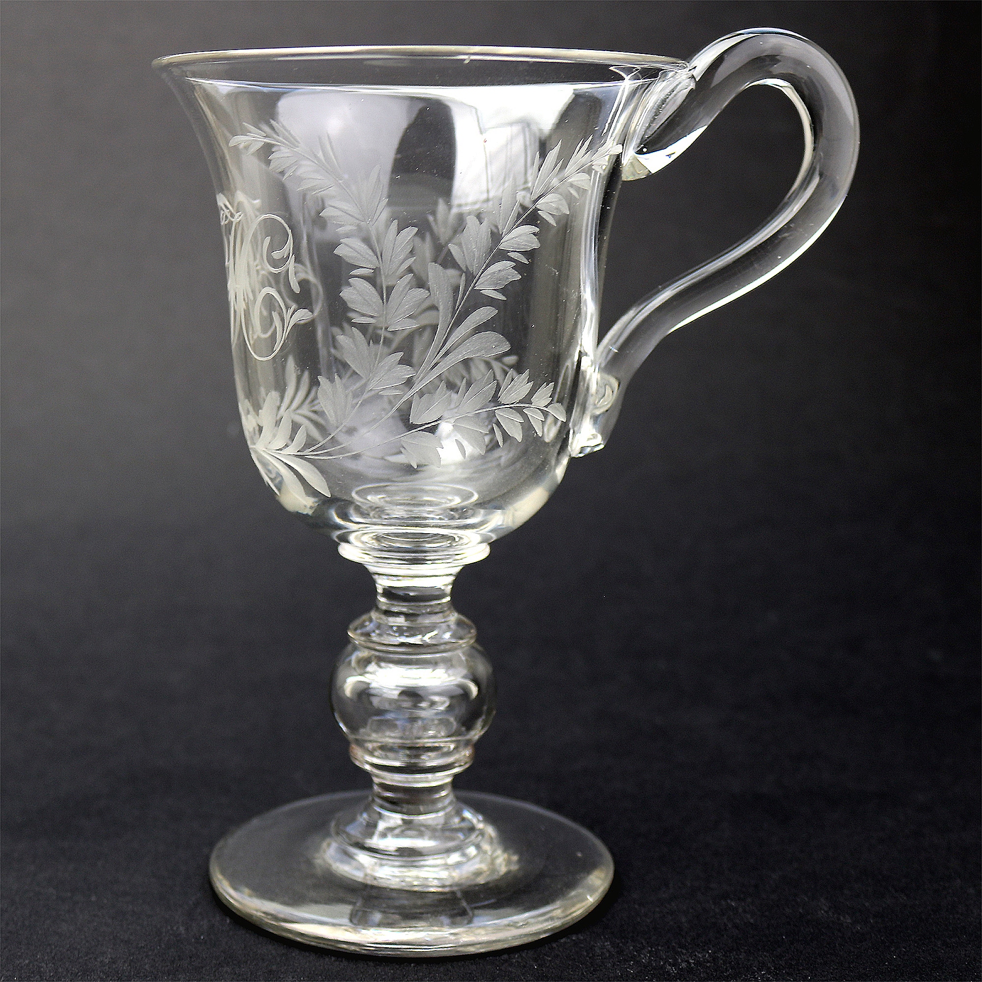 An unusual & substantial antique Victorian engraved hollow stem glass Goblet 19thC