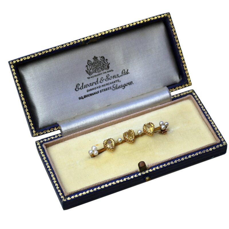 A very fine antique 15ct gold bar brooch set 3X heart cut citrine or yellow topaz C.1900