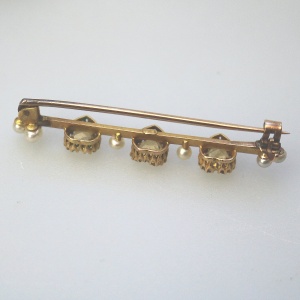A very fine antique 15ct gold bar brooch set 3X heart cut citrine or yellow topaz C.1900