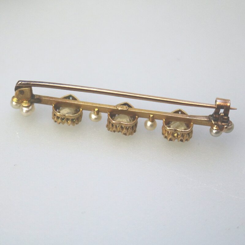 A very fine antique 15ct gold bar brooch set 3X heart cut citrine or yellow topaz C.1900