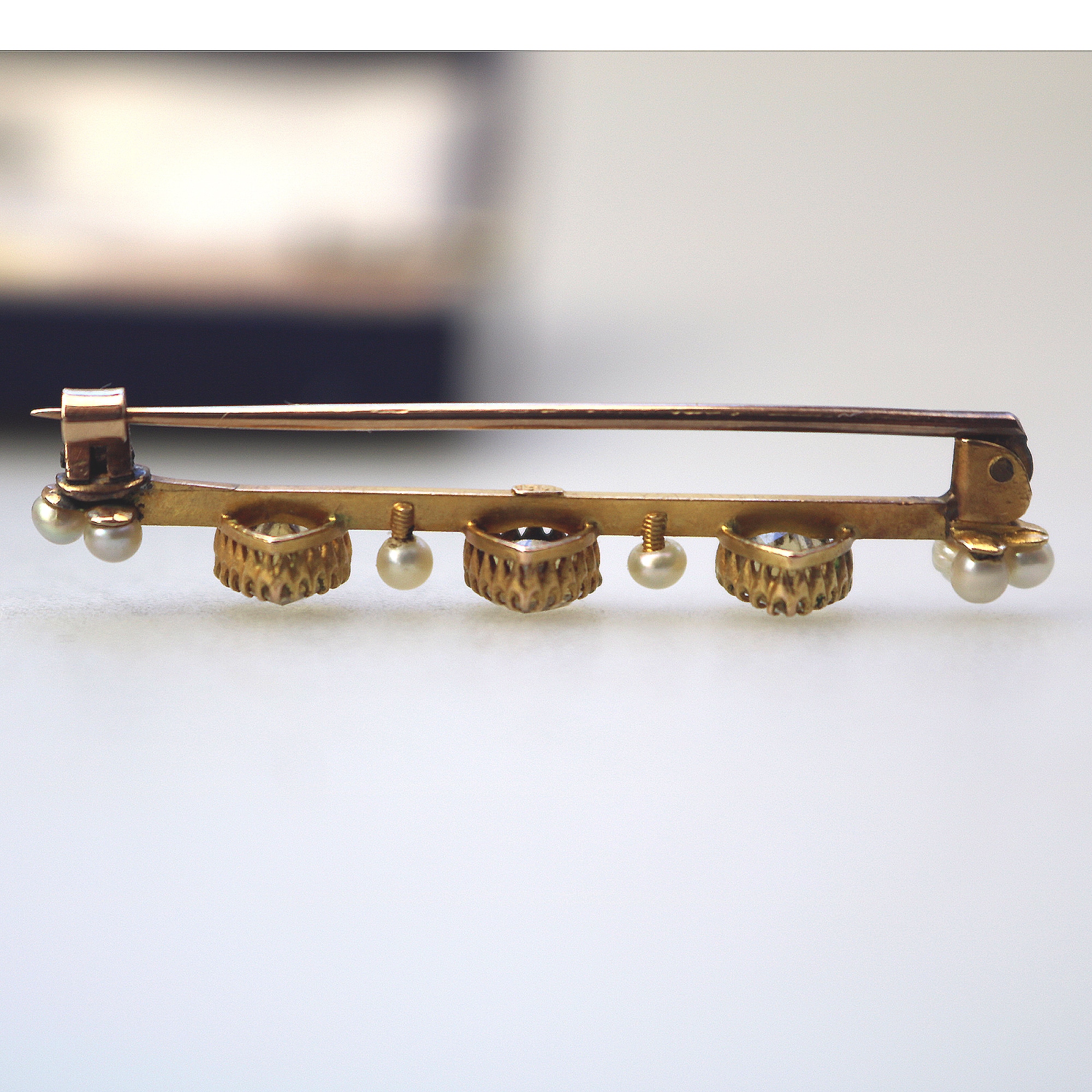 A very fine antique 15ct gold bar brooch set 3X heart cut citrine or yellow topaz C.1900