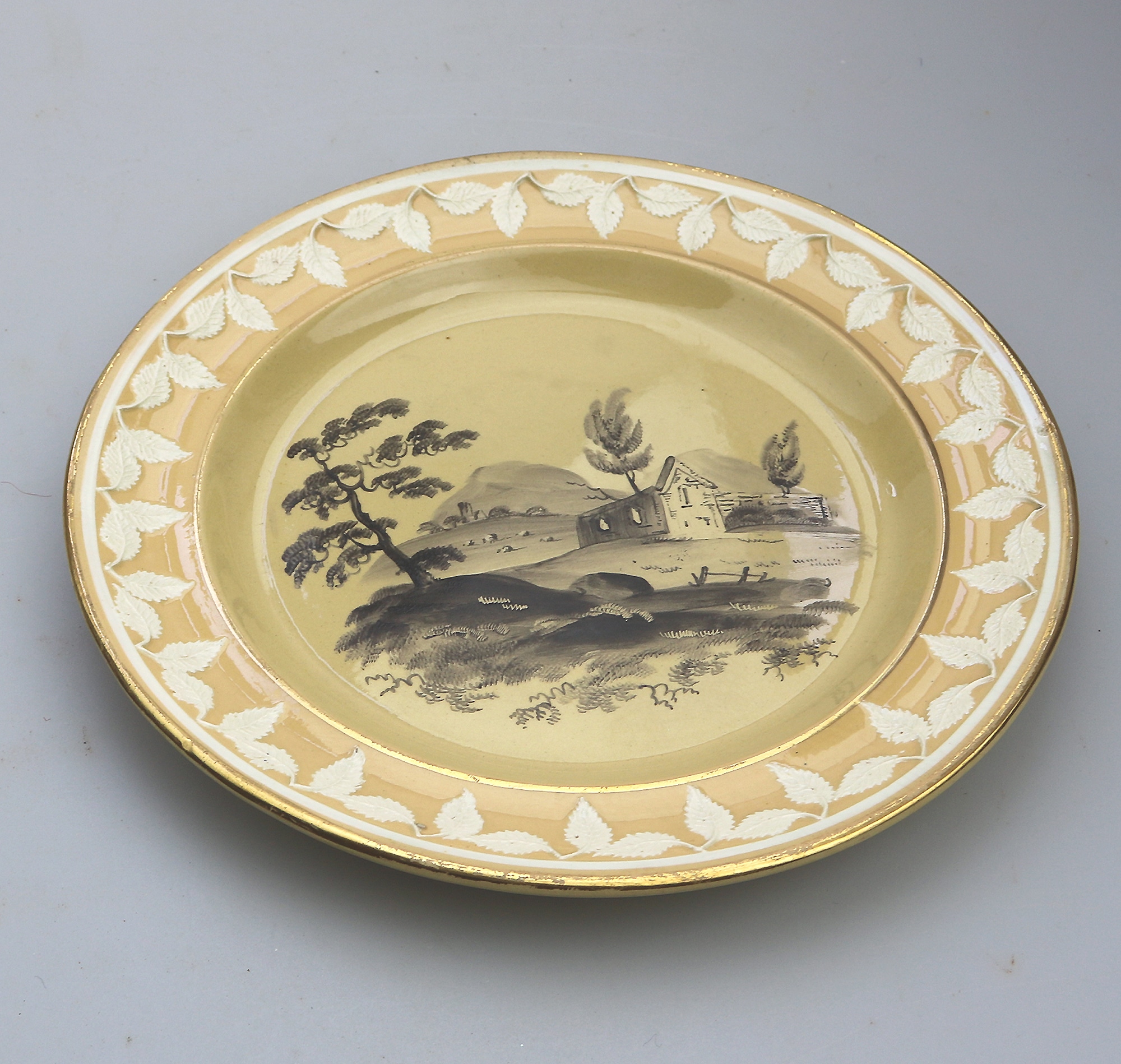 An antique Georgian Staffordshire Drab Porcelain Bat en grisaille Plate C.1790