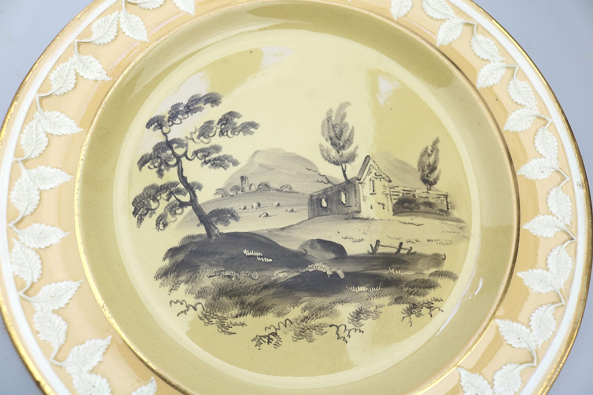 An antique Georgian Staffordshire Drab Porcelain Bat en grisaille Plate C.1790