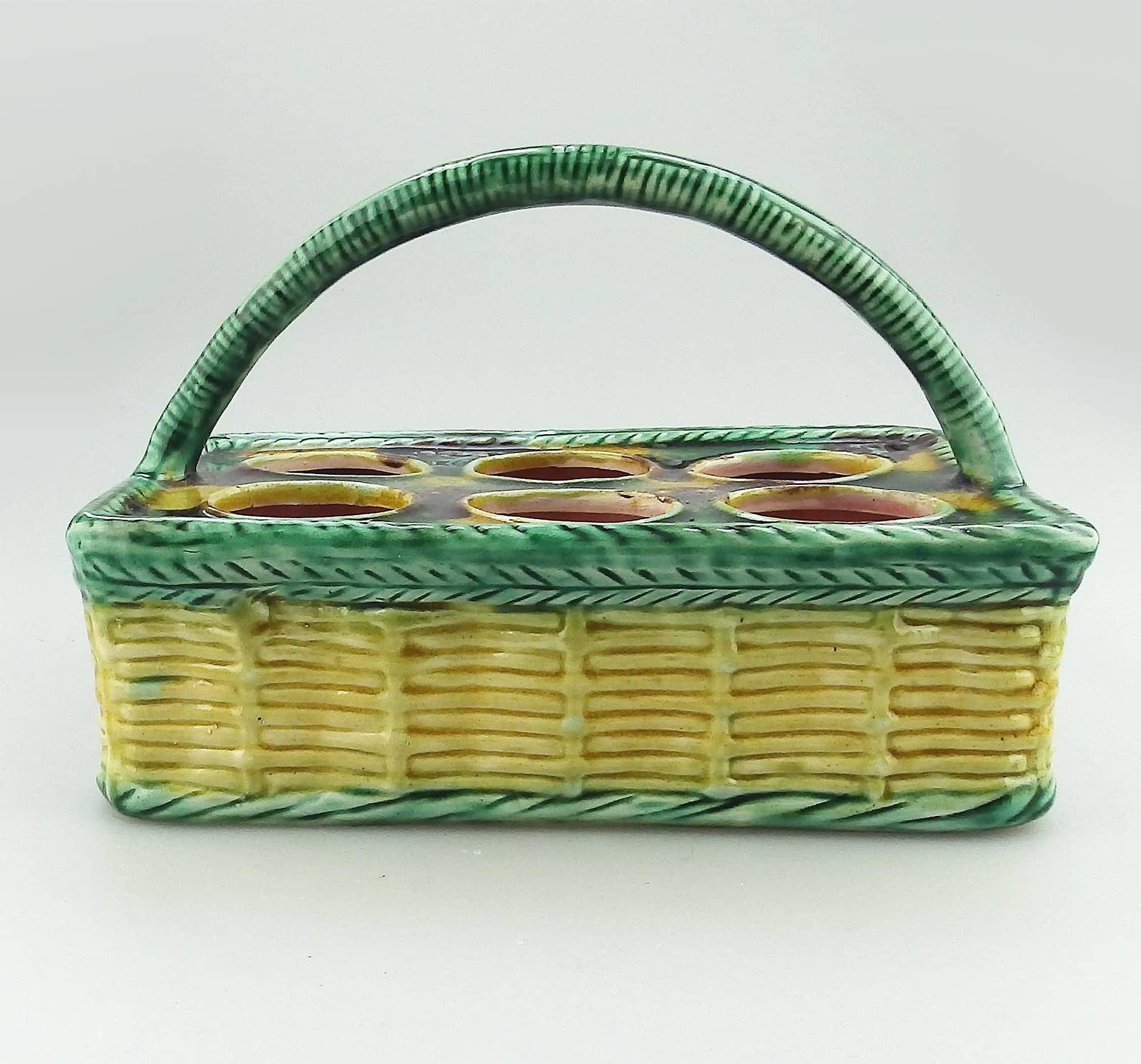 An antique novelty tortoiseshell glaze Majolica pottery Basket Egg Stand C.19thC